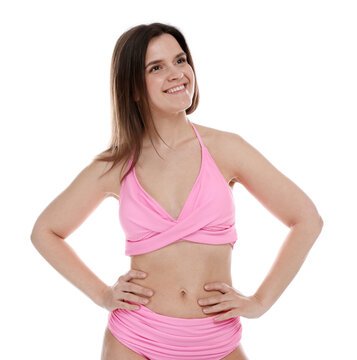Woman in pink swimsuit on white background