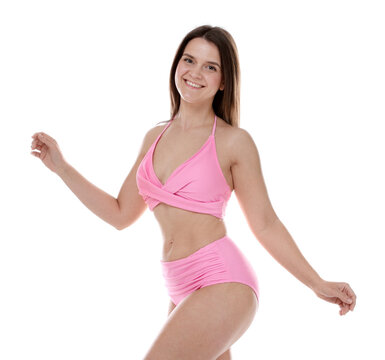 Woman in pink swimsuit on white background