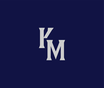 Monogram logo design with KM letters on blue background
