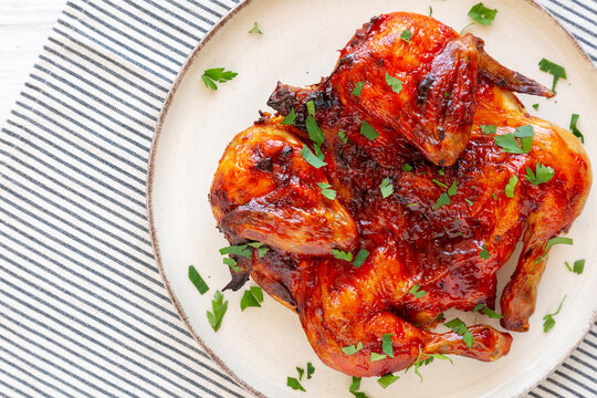 Grilled Homemade Piri-Piri Spatchcock Chicken with Fresh Parsley