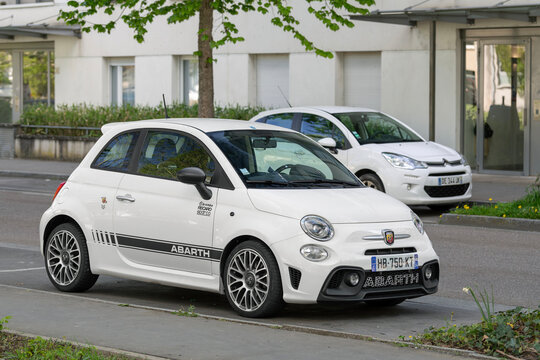 Nancy, France - April 17th 2026 : View on a white Abarth 595 Competizione parked on a street.