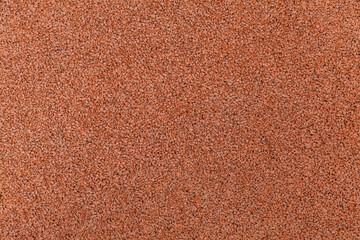 Fototapeta premium Rubber crumb coating. Top view as a background.