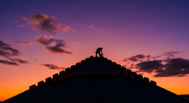 Roofer Silhouette on House Roof at Sunset | Construction Worker on Peak at Dusk | Professional Roofing Service and Home Repair | Tile Installation under Purple Sky | Labor and Industry Concept