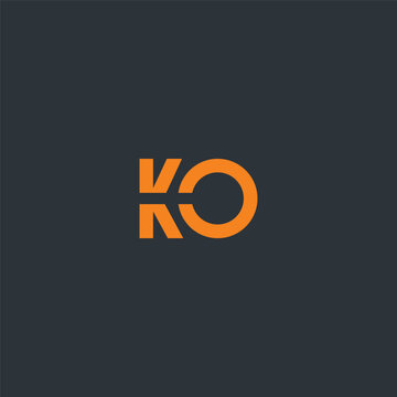 Orange letter KO on dark grey background
