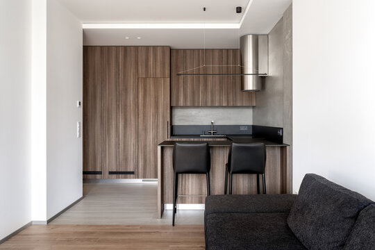 Apartment in contemporary style with wooden kitchen