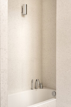Bathroom in contemporary style with tiled walls