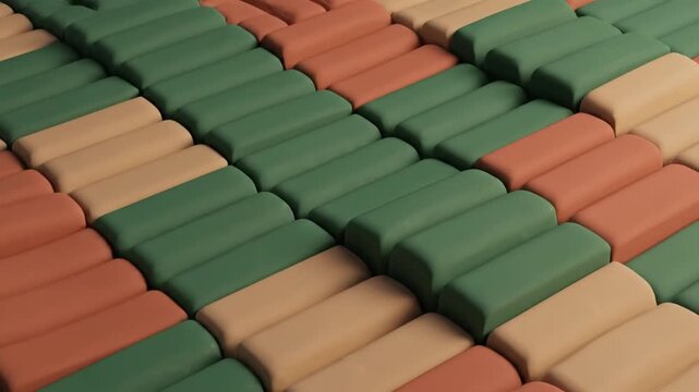 Abstract background of textured rectangular paving stones in a repeating pattern of green, tan, and rust colors, creating a visually pleasing geometric arrangement
