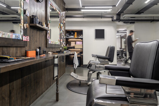 Illuminated classic male hairdresser in loft style