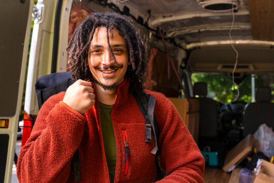 Portrait of man with moving van