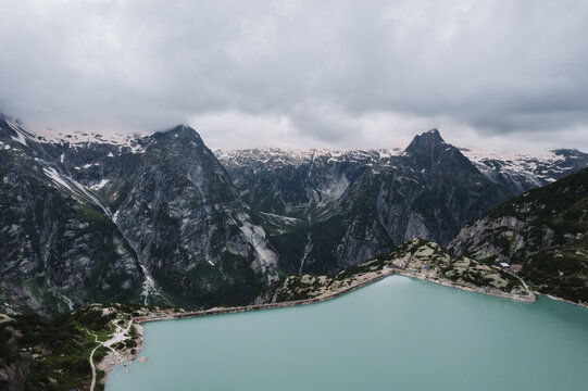 Aerial view of Gelmersee reservoir and dam wall, Bernese Alps