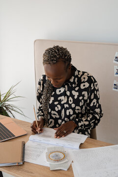 Woman reading aircraft manual