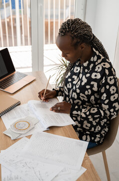 Young black woman studying in flight school