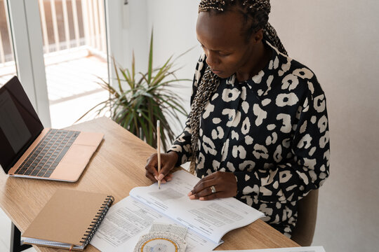 Private pilot studying airplane manual