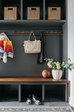 Sporty winter mudroom for a busy family