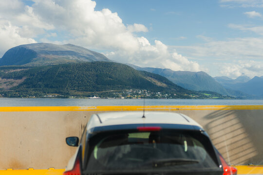 Car on the ferry crossing the fjord 
