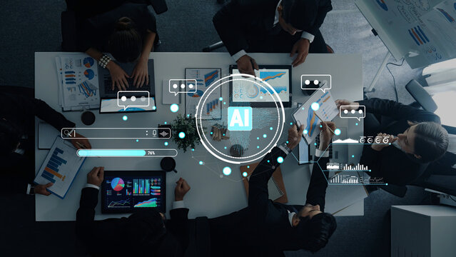 Teams collaborate during a business meeting using artificial intelligence tools and data analytics, emphasizing innovation and efficiency in today workplace. Trope