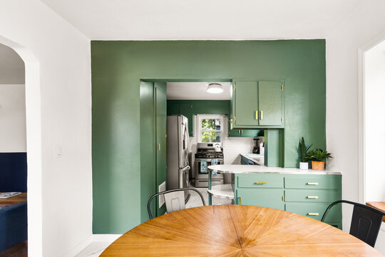 View from Dining Room into Small Kitchen in Home