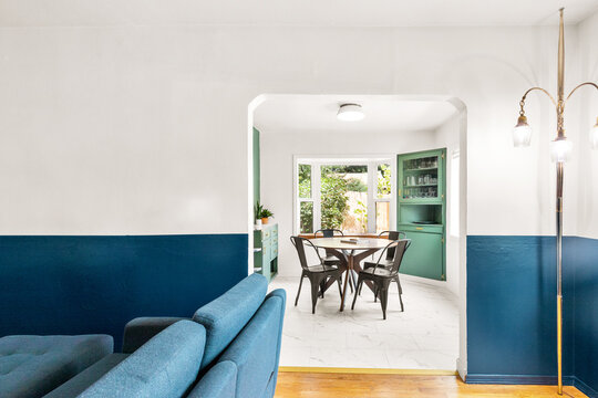 A View from the Living Room into the Bright Dining Room
