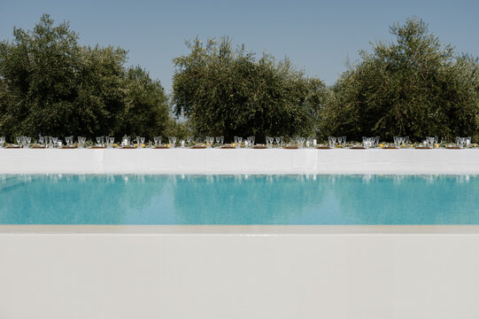 Wedding decor near a serene pool in Italy
