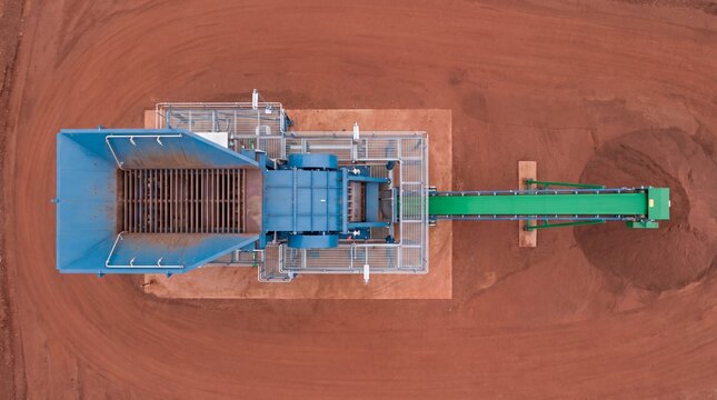 Aerial view of immaculate jaw crusher station on pit bench platform
