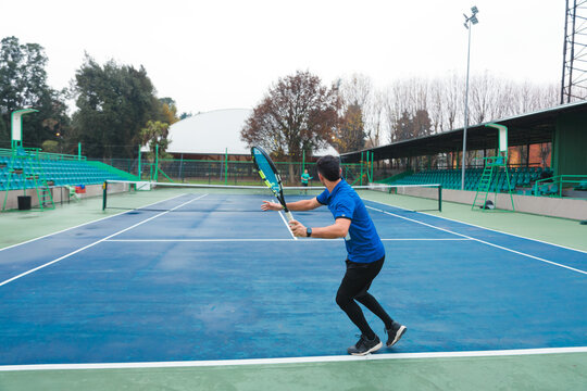Tennis Player Executes a Forehand Shot During Rally