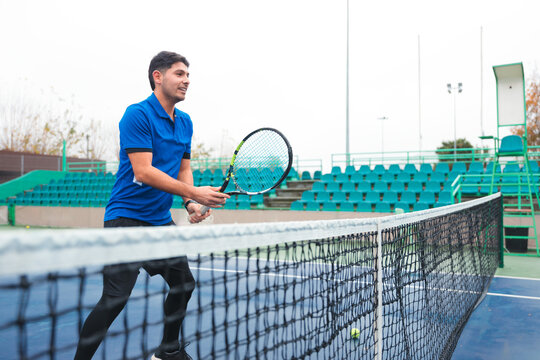 Tennis Player Playing Next to The Net