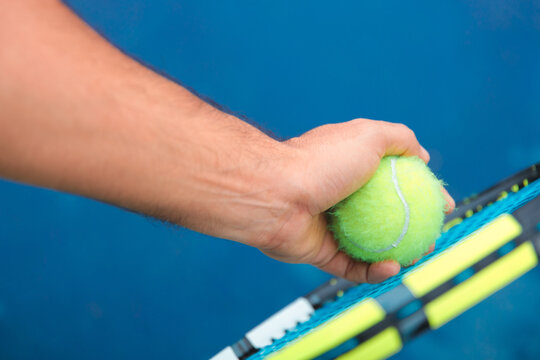 Close-Up of Tennis Ball and Racket Before Serve