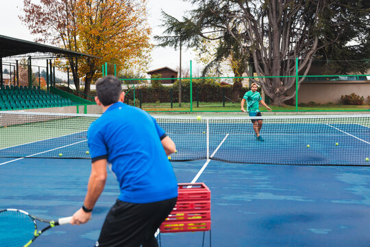 Intense Tennis Practice Session with Coach