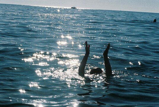 Kid swimming in a sea