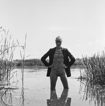 Monochrome Athlete Between Reed