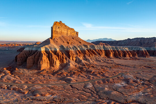 Aerial view of Wild Horse Butte in Goblin Valley State Park, Utah in soft late afternoon light..