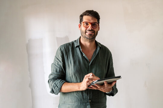 Portrait of an architect smiling at camera