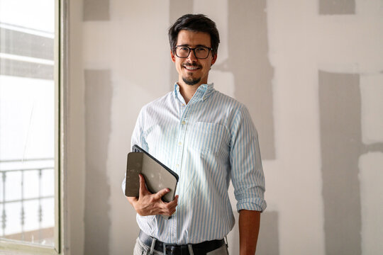 Architect Holding Tablet Portrait