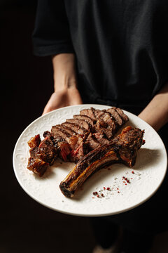 Sliced Tomahawk Steak on Plate