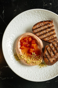 Pate with fruit jam and grilled bread