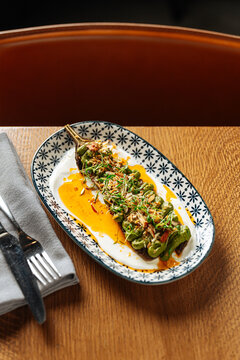 Stuffed Eggplant with Sauce and Herbs