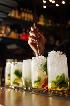 Bartender Mixing Mojito Cocktails