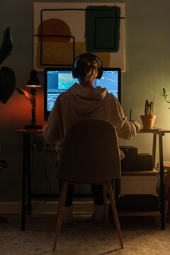 Woman editing content on computer 