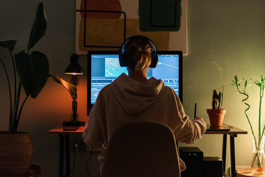 Woman working at cozy home workspace