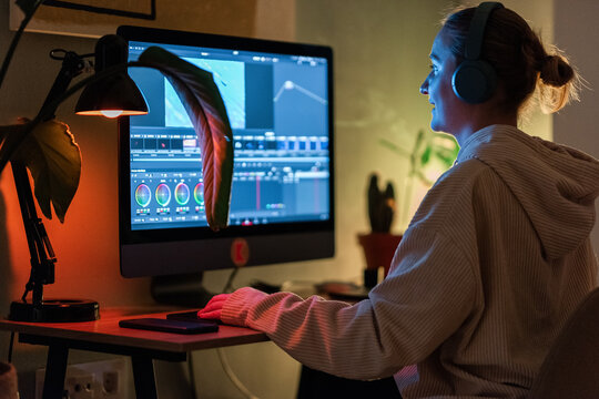 Smiling freelancer working at home