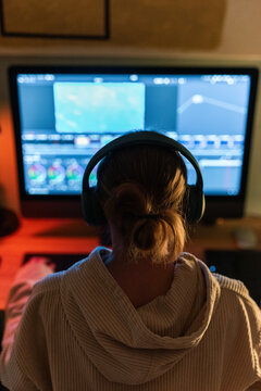 Woman working on project at computer 