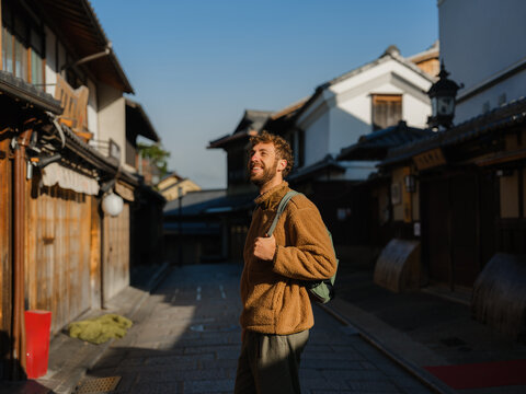 Man exploring streets of Kyoto, Japan 