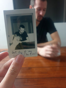 Black and white polaroid of a man for his last day in his twenties