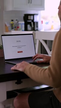 Middle Aged Man Testing Classic Dad Joke Generator Web Application - Dad Jokes On Demand Comic Relief Concept