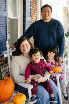portrait of family on the porch 