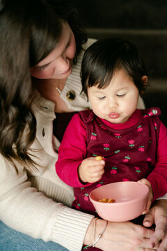 mother and daughter having a snack