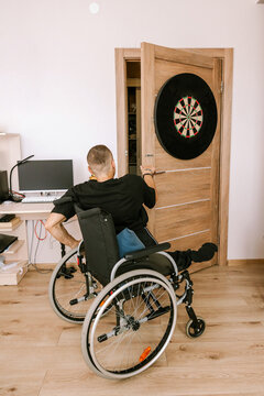 The man opens the door.