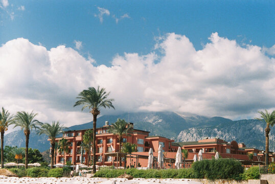 Film Photo of a Mediterranean Resort Hotel with Palm Trees 