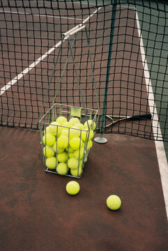 Tennis Balls Basket on Court