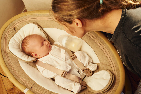 Mother and baby share a moment during feeding time 
